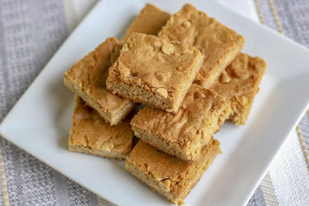 Chocolate chip blondies resting on serving platter