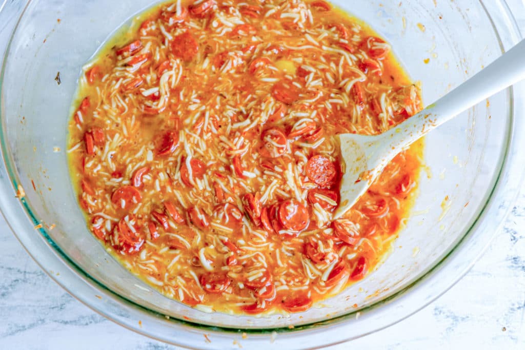 Low Carb Pepperoni Pizza Casserole Ingredients with egg yolk