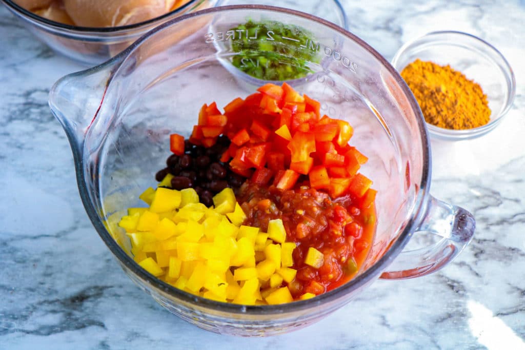 Santa Fe Chicken Foil Packets - combined salsa beans yellow bell pepper red bell pepper lime juice lime zest and the remaining taco seasoning