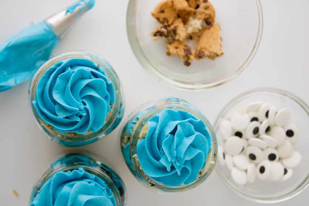 Cookie Monster Treat Jars Assembly - add more frosting